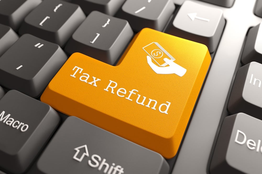 Tax Refund - Orange Button on Computer Keyboard. Internet Concept..jpeg