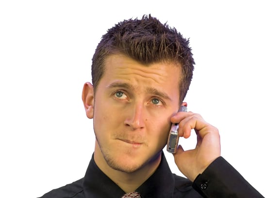 business man expecting bad news on the phone.jpeg