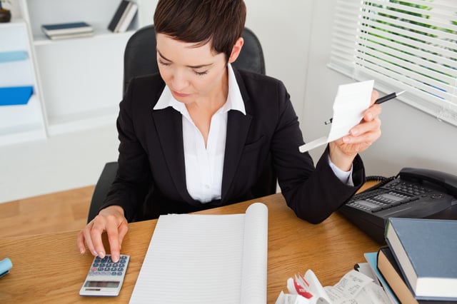 Active accountant checking receipts in her office.jpeg