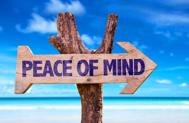 Peace of Mind wooden sign with beach background.jpeg