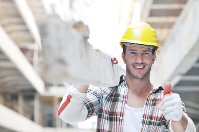 handsome hard worker people portrait at concstruction site.jpeg