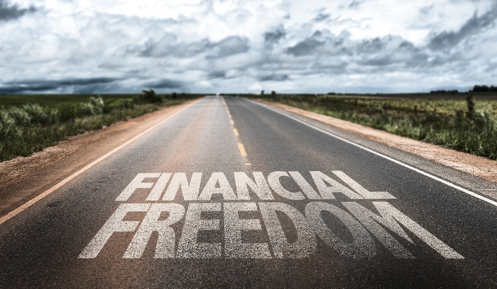 Financial Freedom written on rural road.jpeg